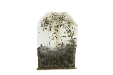 Closeup of an used wet tea bag isolated on white background