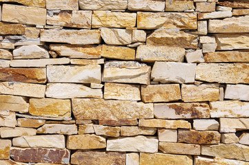 Colorful stone wall closeup
