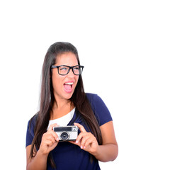 Young beautiful smiling woman holding retro vintage camera again