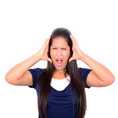 Young woman screaming with hands on head against white backgroun