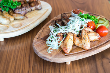 Grilled chicken wings with French fries