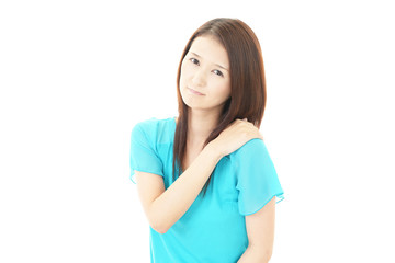 肩痛を訴える女性