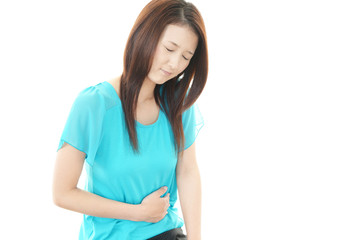 腹痛を訴える女性