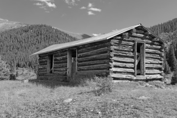 Old log cabin in an abandoned mining town, Western USA