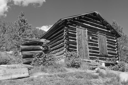 Old log cabin in an abandoned mining town, Western USA