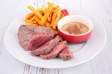 grilled steak and french fries