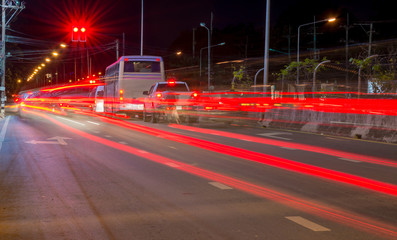 Long exposure photo of light trails on the street