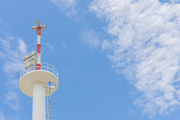 PA / Public Address system speakers, against a bright blue sky