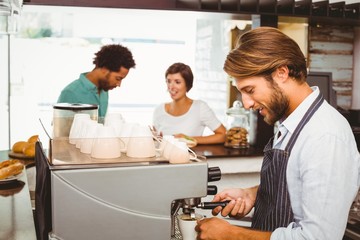 Barista making a cup of coffee