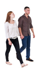 Back view going couple in shorts.