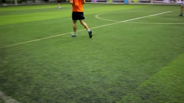 Soccer players on the field view only them legs
