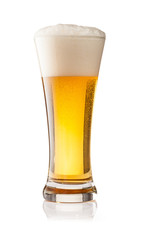 Glass of beer isolated on white background