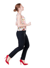 running business woman. back view. going young girl in  suit. Re
