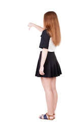 Back view of dissatisfied woman thumbs down.