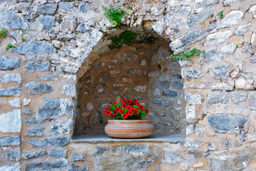 stonewall niche with flowerpot