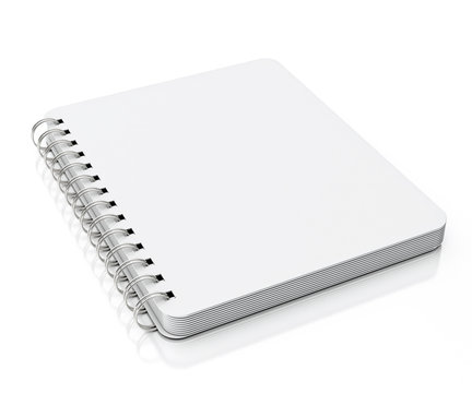 empty spiral notebook lying isolated on white
