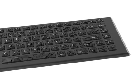 Black broken keyboard with cracks isolated on white background