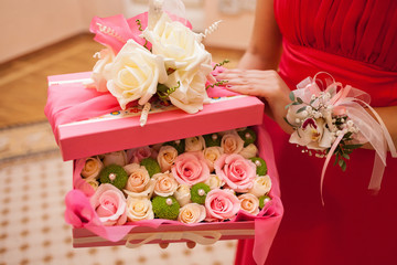 flowers in a pink box