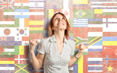 Lucky woman over flags background