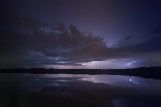 Supercell thunderstorm at night with lightning