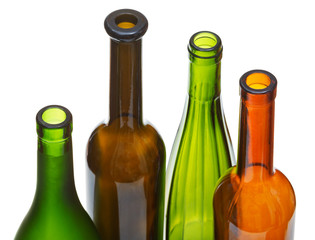 four open bottlenecks of colored wine bottles