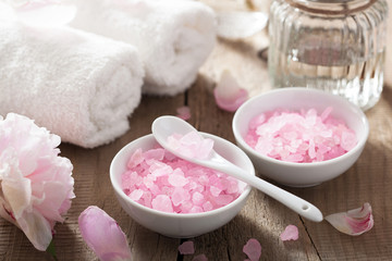 spa set with peony flowers and pink herbal salt