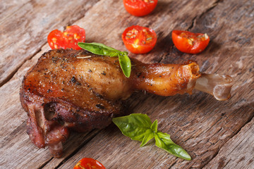 roasted duck leg with basil and cherry tomatoes horizontal