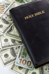Obraz premium Holy Bible and money