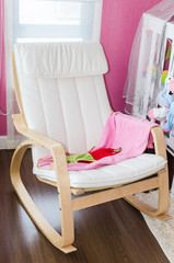 Fototapeta na wymiar modern white rocking chair