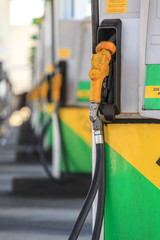 Nozzle of fuel pump on petrol station.