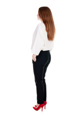 back view of redhead business woman contemplating.