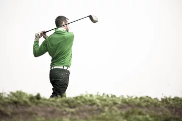 Tableaux ronds sur aluminium brossé Golf homme jouant au golf