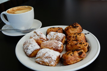 Cup Of Cappuccino And Cakes