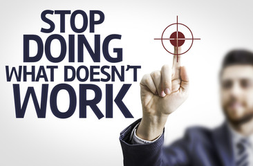 Business man pointing: Stop Doing What Doesn't Work