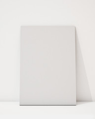 blank poster on the white wall and the floor