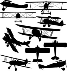 Silhouettes of old aeroplane - contours of biplanes