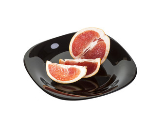 Ripe grapefruits on a plate