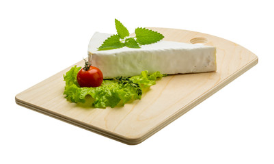 Fototapeta na wymiar Brie cheese with thyme