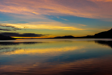 Fototapeta na wymiar Sunset on Villarrica's lake from Pucon's Beach, Chile