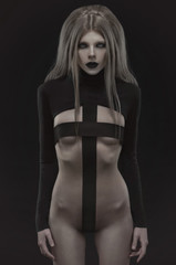 Gothic woman in creative black outfit