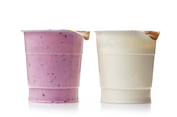 two plastic yogurt pots