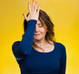 Woman realizes mistake slapping hand on head to say duh