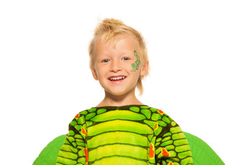 Close portrait of boy in dragon costume