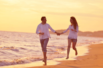 young couple  on beach have fun