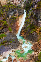 Fototapeta na wymiar Waterfall on mountain river