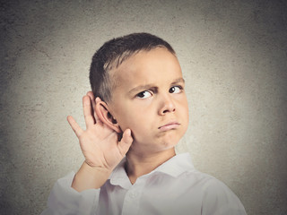 Curious man, boy, listens parents adult talk hand to ear gesture
