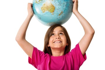Cute pupil smiling holding globe