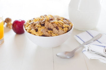 A varied breakfast in the morning isolated on white