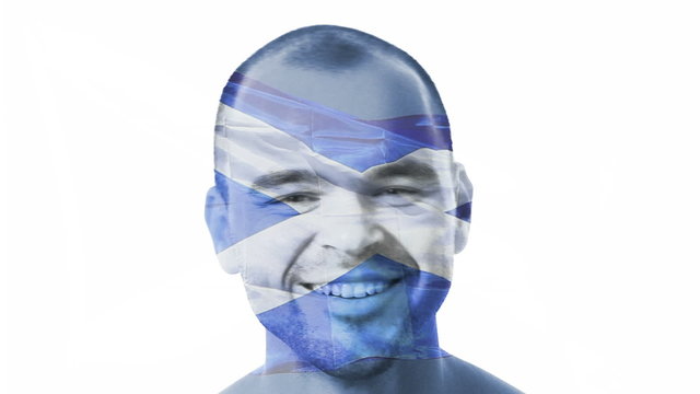 Flag of Scotland over a face of a young adult man.