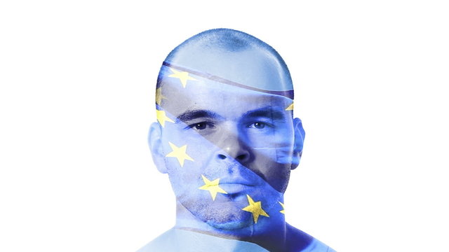 Flag of EU - European Union over a face of a young adult man.